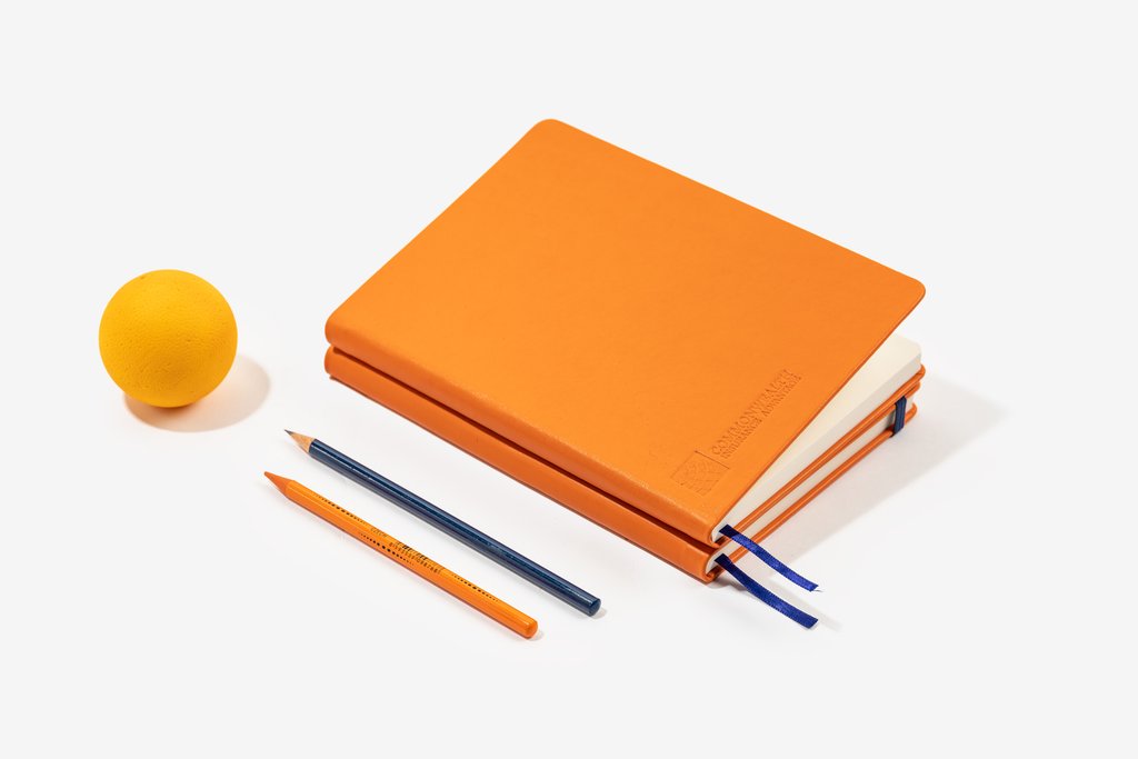 Set of 2 orange real leather notebooks with embossed logo